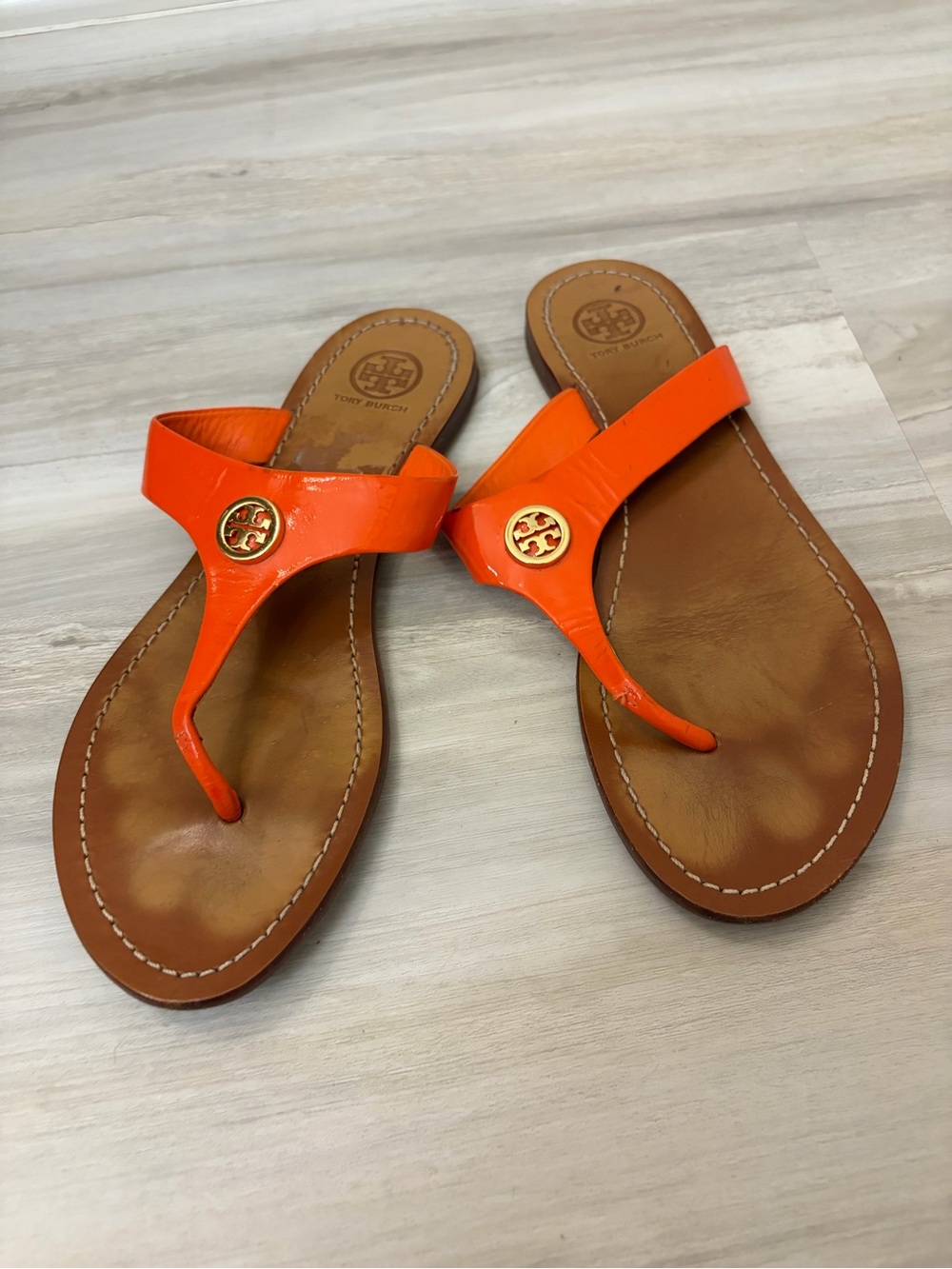 Tory Burch Orange Patent Leather Miller Thong Sandals- Used condition.